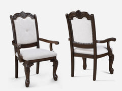 Elevate your dining experience with this exquisite and elegantly crafted set, designed to bring timeless sophistication to your home. The grand rectangular table features a rich, dark finish and intricately carved double pedestal base, making it the perfe