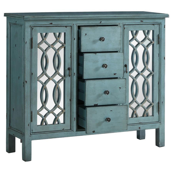  while two side doors with mirrored insets and carved lattice detail