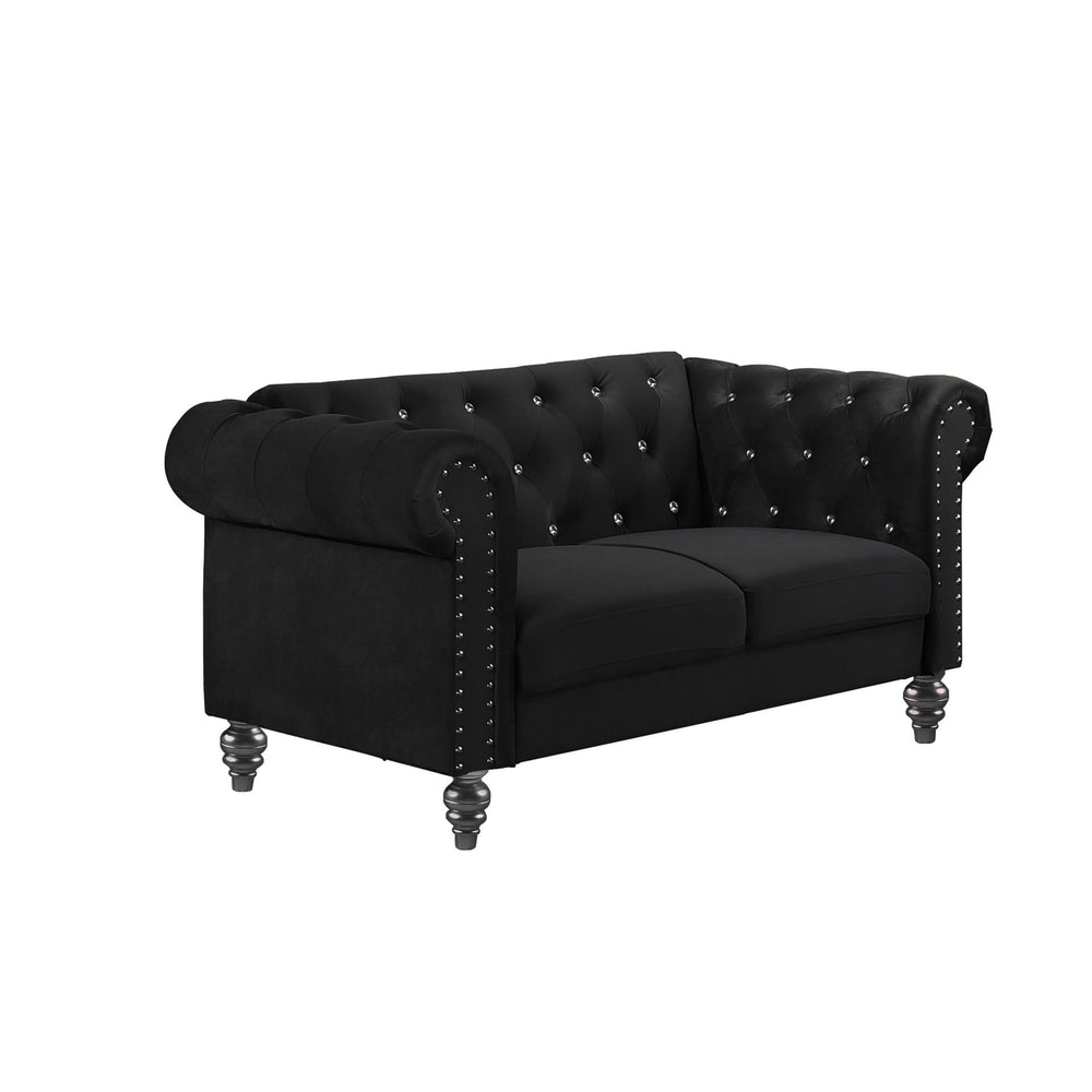 The New Classic Emma Chesterfield Velvet 2 Seat Sofa Loveseat is a blend of soft elegance and sophisticated design. Crafted from 100% polyester velvet fabric, it offers cozy and indulgent seating for two. The glam tailoring features tufted backs and arms 