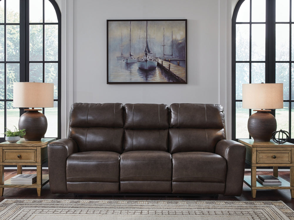 Versatile style teams up with everyday convenience to create this power reclining sofa. Settle into the sleek leather seating area and effortlessly recline with one-touch controls. Need some extra ambiance? Wireless speakers in the drop-down table make en