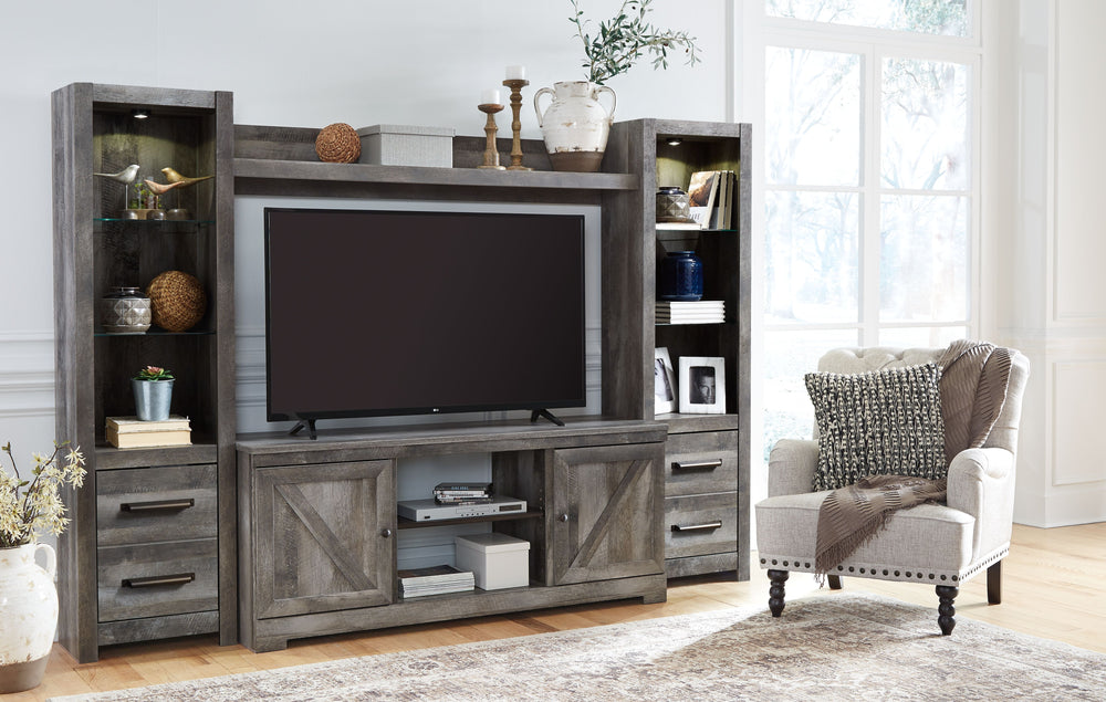 This entertainment center is sure to win your heart with its daring designer take on modern rustic. Its crisp, clean and minimalist-chic profile is enriched with a striking replicated oak grain with thick plank styling and a weathered gray finish for that