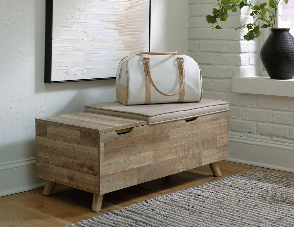The clean profile of this small storage bench makes an entrance anywhere and everywhere you place it. Replicated butcher-block wood grain effect and tapered wood legs lend a fresh flair. Adding form and function, both tops are removable to expose hidden s