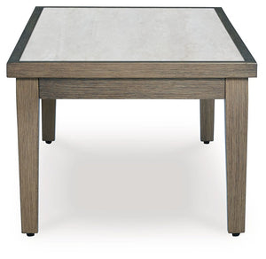  while the sintered stone tabletop adds an element of natural elegance. This del