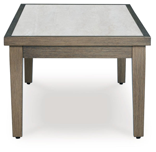  while the sintered stone tabletop adds an element of natural elegance. This del