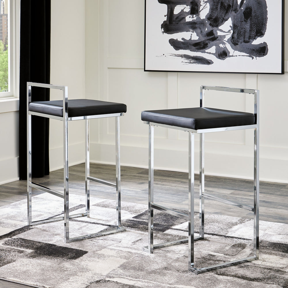 Wowing with a slim but sturdy profile and sculptural design, this bar stool is sure to whet your appetite for ultra-contemporary style. Its comfortably cushioned seat is covered in a fabulous black faux leather, while the metal frameâ€™s chrome-tone finis