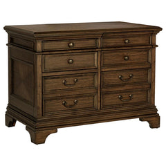 A stately upgrade for the traditional filing cabinet. This piece is crafted for classy office spaces. An expansive tabletop with molding accents offers an elegant option to place office items. Eight drawers flaunt round knobs and traditional style bar pul