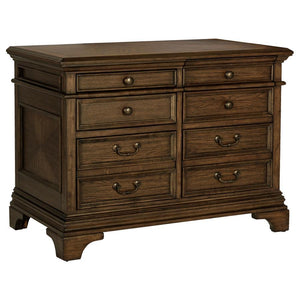 A stately upgrade for the traditional filing cabinet. This piece is crafted for classy office spaces. An expansive tabletop with molding accents offers an elegant option to place office items. Eight drawers flaunt round knobs and traditional style bar pul