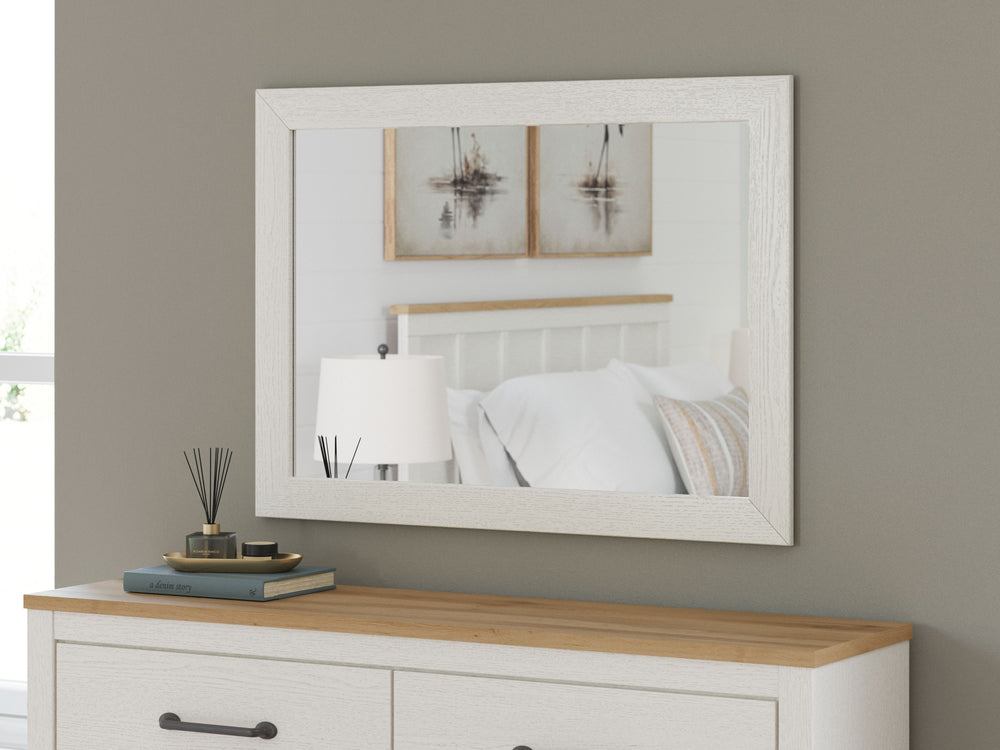 Add a touch of farmhouse-style inspiration to your bedroom with this bedroom mirror. Simple in design, it can be used to adorn a dresser or to reflect light in a special display area. Elevate the soothing ambiance of your restful retreat with this charmin