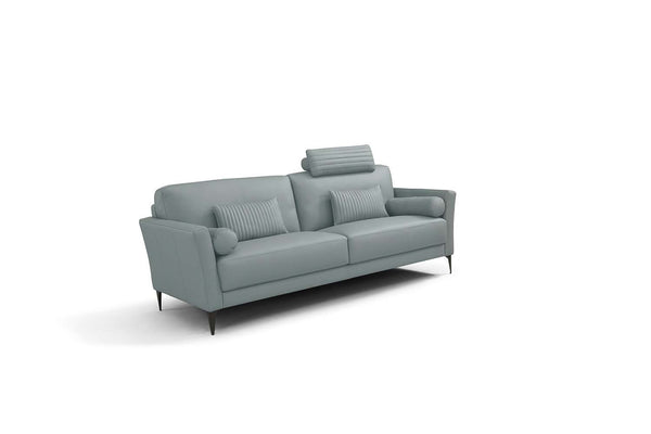  the Tussio collection offers comfort and style. The gorgeous watery leather finish is fresh and fun. Included are bolster cushions and pillows to match the seating. The headrest provides added comfort