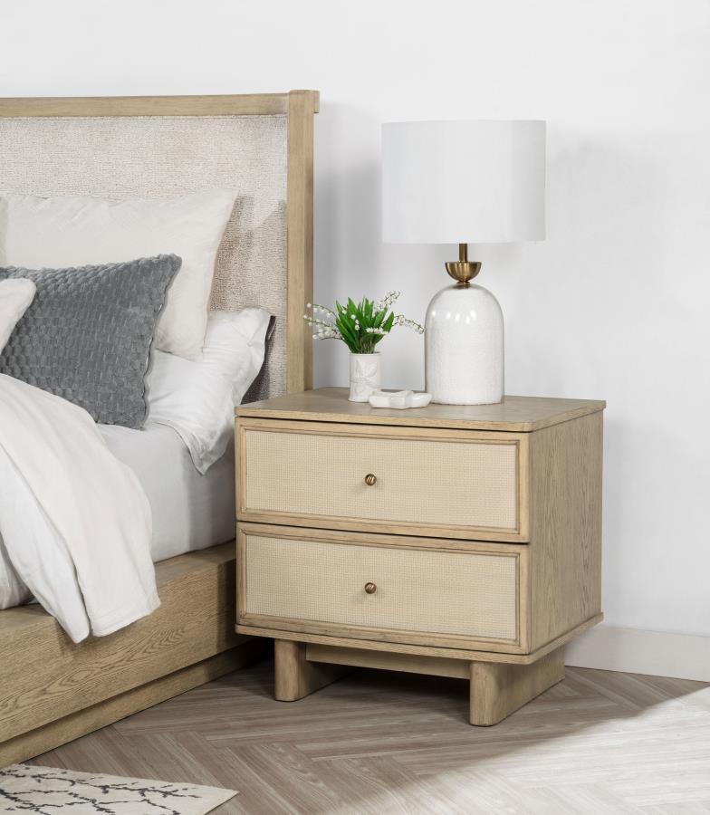 This nightstand combines practicality with elegant design, offering two drawers for convenient bedside storage. Finished in beige oak, it features smooth metal extension glides for easy access and antique brass hardware for a touch of vintage charm. The i