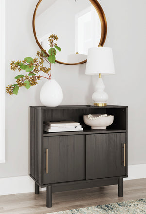  this accent cabinet creates a sense of modern harmony in your room. The subtle warm gray finish and black burnished goldtone handles add an authentically modern touch. Elevate your environment to coolly 