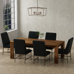 Crafted from solid mango, this table boasts a unique aesthetic with natural variations of color, wood grain, and knots. The geometric mitered edge creates a seamless transition between the table top, apron, and angled legs, and is generously proportioned 