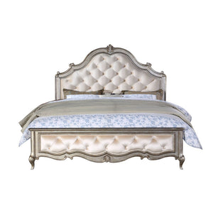 Every piece in the Esteban bedroom collection reflects vintage glam style! Gorgeous details such as raised scroll trim on cabriole legs and mirrored fronts transform the case pieces into something extraordinary. Button tufting on a velvet-upholstered arch