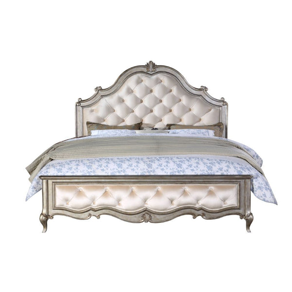 Every piece in the Esteban bedroom collection reflects vintage glam style! Gorgeous details such as raised scroll trim on cabriole legs and mirrored fronts transform the case pieces into something extraordinary. Button tufting on a velvet-upholstered arch