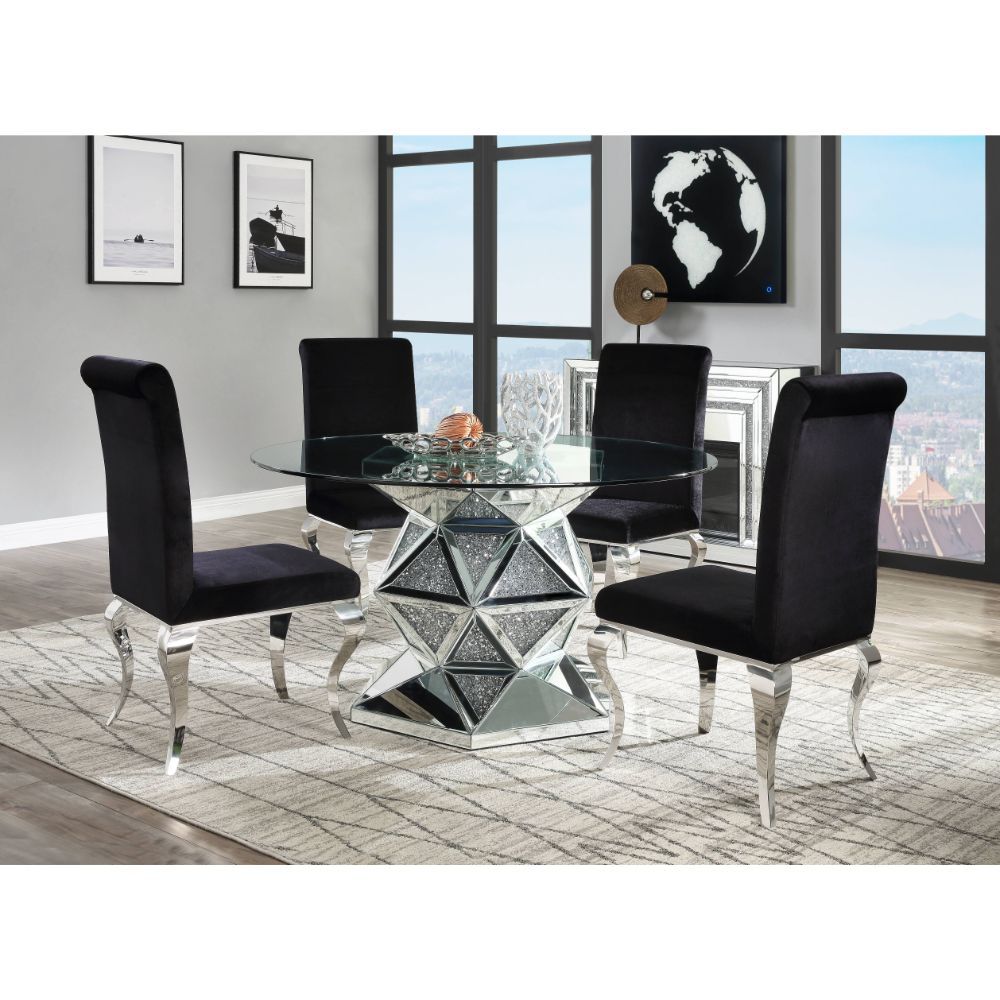 The Noralie dining set is the perfect centerpiece for any social gathering. A clear glass top keeps the focus on the sparkling faux diamond inlay of the pedestal table base. Matching side chairs feature curved cabriole legs in a stainless steel finish tha