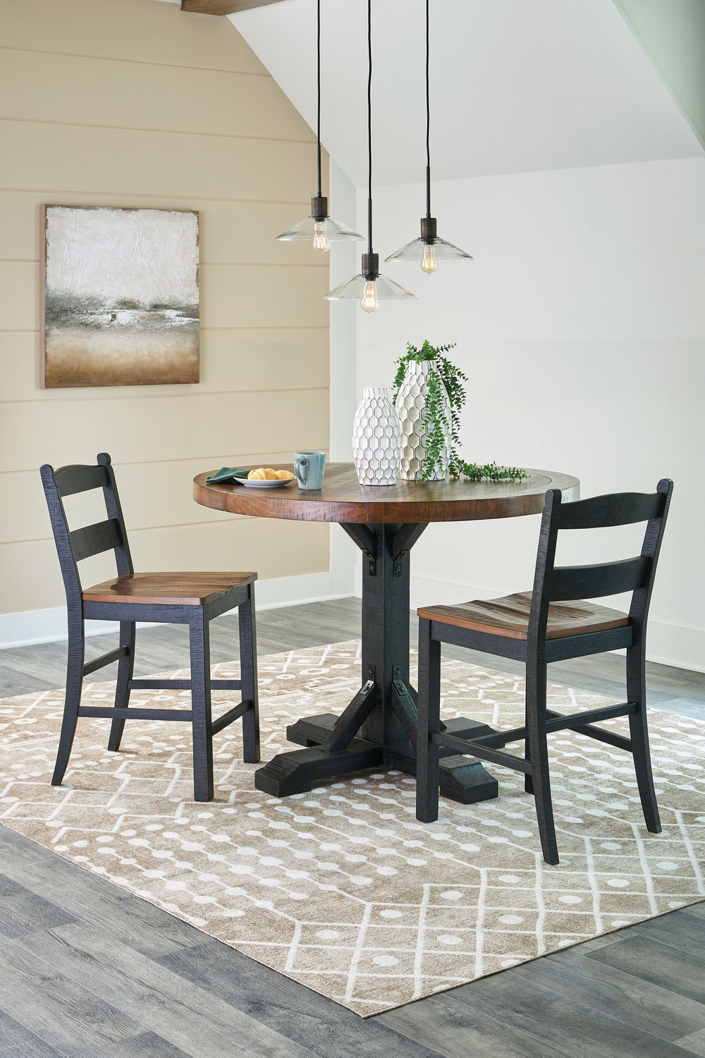 This set serves up the best in cottage styling. A charming choice, its two-tone finish is versatile enough for many casual aesthetics. Round counter height table features a sturdy post and bracket base design in a rustic black finish with a thick 48-" rou