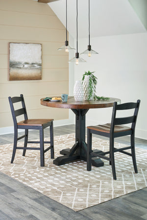 This set serves up the best in cottage styling. A charming choice, its two-tone finish is versatile enough for many casual aesthetics. Round counter height table features a sturdy post and bracket base design in a rustic black finish with a thick 48-" rou