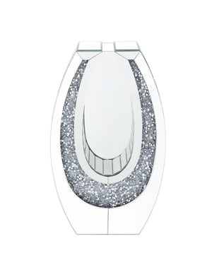  this piece showcases an oval mirrored frame