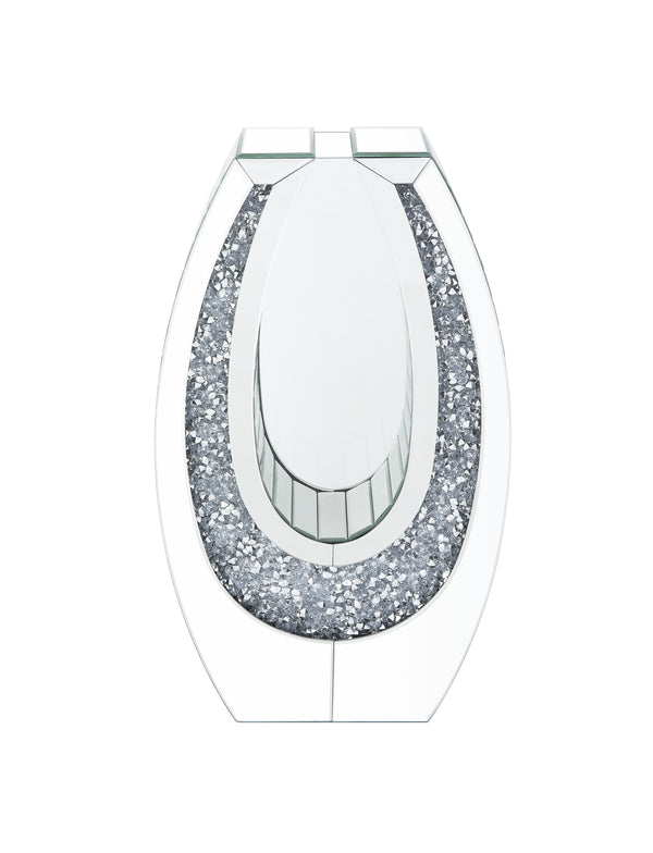  this piece showcases an oval mirrored frame
