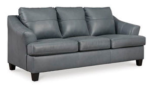  this set is a handsome marriage of masculine and feminine sensibilities. Soft-to-the-touch leather match upholstery