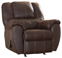 Rock the cool look of leather and the warm feel of fabric with this rocker recliner. Sporting sumptuously thick cushioning, fashion-forward jumbo stitching and a richly tailored aesthetic, this smartly priced recliner with gentle rocking motion is a bests