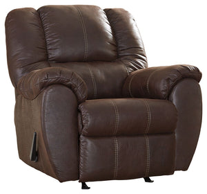 Rock the cool look of leather and the warm feel of fabric with this rocker recliner. Sporting sumptuously thick cushioning, fashion-forward jumbo stitching and a richly tailored aesthetic, this smartly priced recliner with gentle rocking motion is a bests