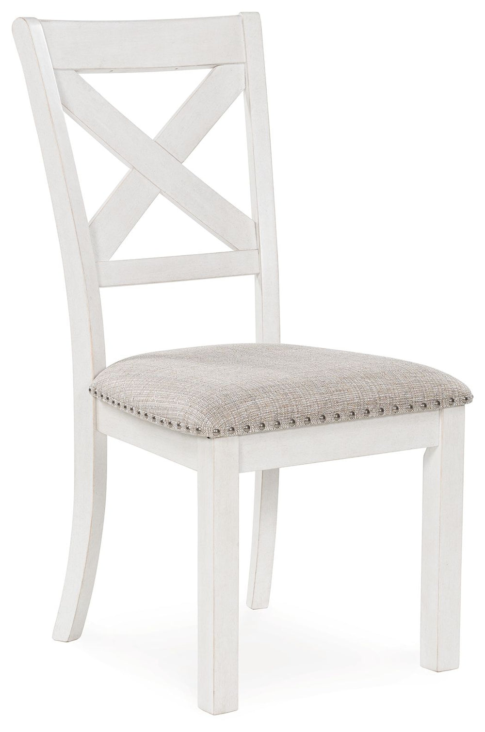 This dining chair is sure to impress come mealtime. With its antiqued white finish, classic country X-back and light gray upholstery with nailhead trim, modern farmhouse-style dining has never been so fashionable. All that-'s missing is you and your famil