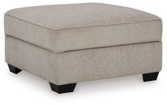 Looking for furniture with extra benefits? This ottoman delivers more than meets the eye, with concealed storage and cup holders beneath the removable cushioned top. With soft upholstery and a generous scale, it greatly enhances your lounge space when pai