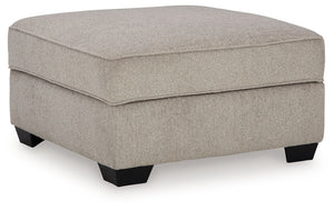 Looking for furniture with extra benefits? This ottoman delivers more than meets the eye, with concealed storage and cup holders beneath the removable cushioned top. With soft upholstery and a generous scale, it greatly enhances your lounge space when pai