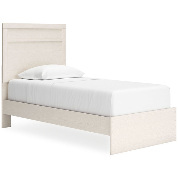 With its clean-lined look and modern attitude, this panel bed is a fresh style awakening. A crisp, white hue over subtle replicated wood grain easily complements other furniture finishes. Its simple, unadorned profile is given depth and dimension with the