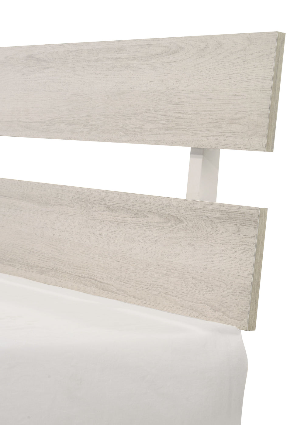 This bedroom collection embodies a rustic, yet contemporary aesthetic with its clean lines and neutral color palette. The set includes a low-profile bed frame, a dresser with a mirror, and a tall chest, all finished in a versatile white wash that easily c