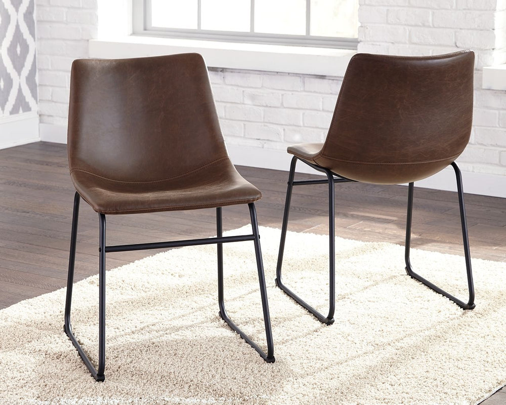 With its distinctive contoured bucket seat and tubular metal base, this dining chair serves up a fresh twist on mid-century inspired style. Faux leather upholstery has a charmingly vintage tone. What a timeless look for eat-in kitchens and casually cool d