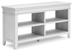 Make a style statement with this home office credenza. Its traditional design is updated with an on trend distressed whitewash finish. The credenza-'s open storage and adjustable shelving add up to a well-organized workspace.<br><br><b>Additional Dimensio