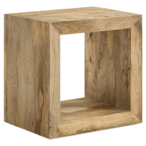 Embracing the very soul of natural design principles, enhance your living room with this end table crafted from solid mango wood. Featuring a natural finish, it showcases the wood-'s unique grain patterns for a touch of organic charm. The open cube design