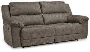 Is being too comfortable even possible? Itâ€™s worth finding out in this reclining sofa. Wrapped in the plushest of neutral faux leather upholstery, it-'s perfectly cushioned in all the right places. We love the sofa-'s super-wide seating, with plenty of 