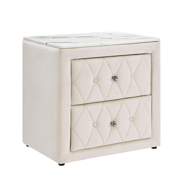 This elegant nightstand brings a touch of luxury to any bedroom with its rich, velvety texture and diamond-patterned tufting. The soft, plush exterior is complemented by gleaming crystal-like drawer knobs, adding a hint of glamour. With two spacious drawe