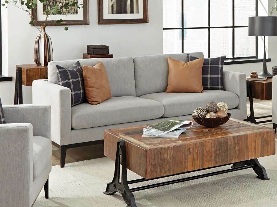 You and your loved ones will be lounging in style on this chic, comfortable sofa. With its understated, transitional design, it blends seamlessly with the decor of any living room. Soft, grey upholstery subtly plays up its simple silhouette. Two matching 