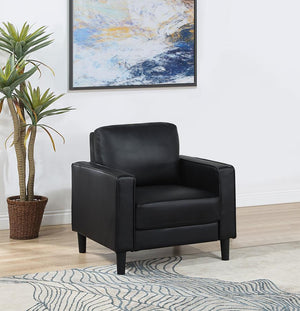  this modern armchair is a chic choice. It features a structured silhouette with a compact footprint and straight track arms. Faux leather upholstery is smooth and sleek
