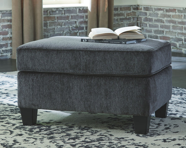  youâ€™re sure to find this ottoman beautifully fits the bill. Covered in a smoke gray chenille upholstery loaded with plush texture