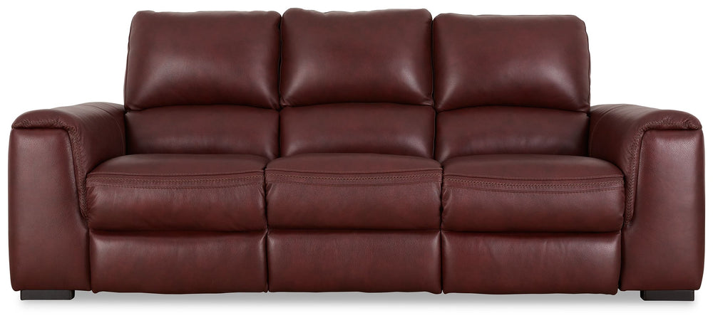 Impressive in scale while keeping an air of refinement, this power reclining sofa stuns with a combination of soft, supple leather and perfectly matched faux leather upholstery in garnet. Sink into the seating area and cater to your comfort with one-touch