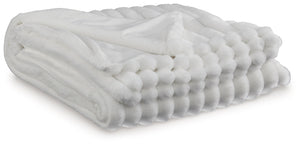 As cozy as they come, this faux fur throw turns your seating area into a haven of comfort. Its neutral hue acts as the perfect foundation for layering, whether mixed with pillows or draped over the arm of a sofa. And itâ€™s machine washable, so you can sp