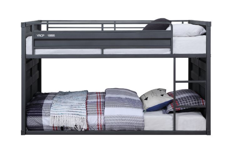 Designed shorter than the average bunk bed, this Cargo twin over twin bunk bed is excellent for low ceiling bedrooms. With its whimsical shipping container design and sturdy metal frame, this is one piece that will impress everyone. It features a slat sys