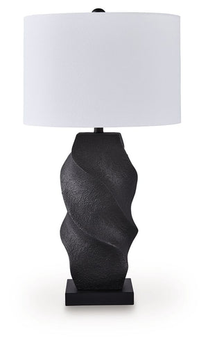 This table lamp puts a chic twist on casual lighting. Its base draws the eye in with a rich sense of movement, while the classic black finish has the versatility to pair with a variety of styles. Place it on a desk or end table for instant functional flai