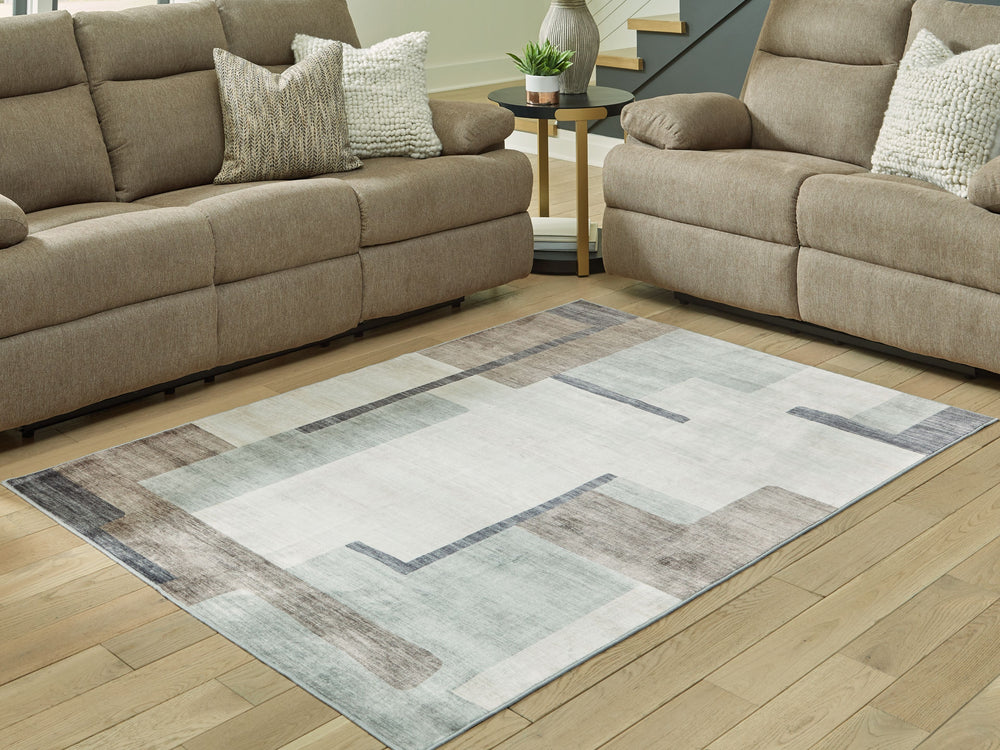 The dynamically layered, neutral tones of this rug make an artistic impression, all while suiting a variety of contemporary color palettes. Its super-soft faux fur construction offers a cozy feel, while the abstract design adds depth and dimension to a li