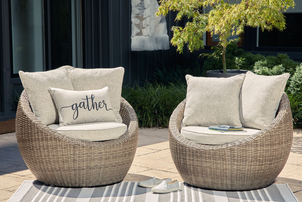 This swivel lounge chair completes your outdoor seating area with its fresh take on casual comfort. Handwoven resin wicker over a curving aluminum frame balances streamlined style and exceptional durability. High-performance beige Nuvella+â„¢ fabric wraps