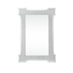 The Nowles mirror offers function and style to any modern setting. This rectangular wall mirror features beveled mirrored border trim with faux diamonds inlay that glimmer and glitter in the available light. Its frame crafted from durable engineered wood.