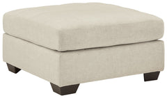 Destination: urban oasis. Elevate your design aesthetic with a chic look inspired by city living. Sleek, sultry and tailored to a T, this oversized accent ottoman lures with comfortably soft box cushions and dramatic jumbo stitching for fashion-forward fl