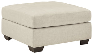 Destination: urban oasis. Elevate your design aesthetic with a chic look inspired by city living. Sleek, sultry and tailored to a T, this oversized accent ottoman lures with comfortably soft box cushions and dramatic jumbo stitching for fashion-forward fl