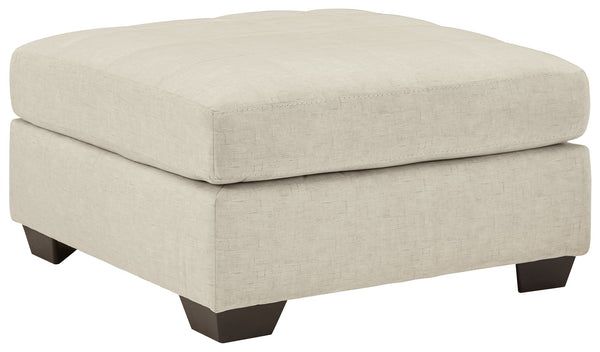 Destination: urban oasis. Elevate your design aesthetic with a chic look inspired by city living. Sleek, sultry and tailored to a T, this oversized accent ottoman lures with comfortably soft box cushions and dramatic jumbo stitching for fashion-forward fl
