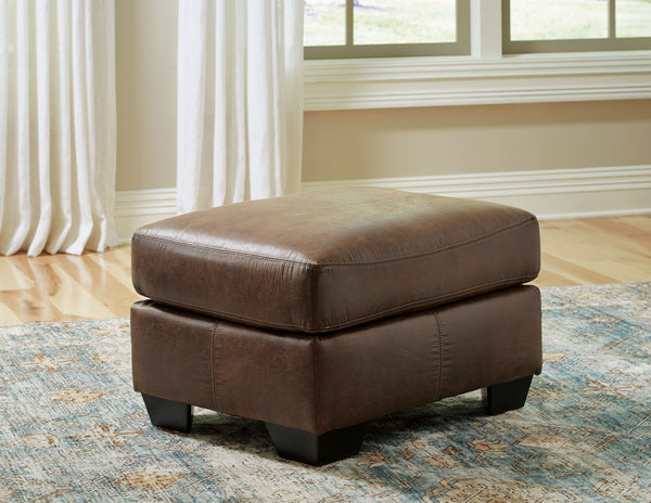  you-'ll find this ottoman fits the bill beautifully. Enhancing its handsome profile: a textural